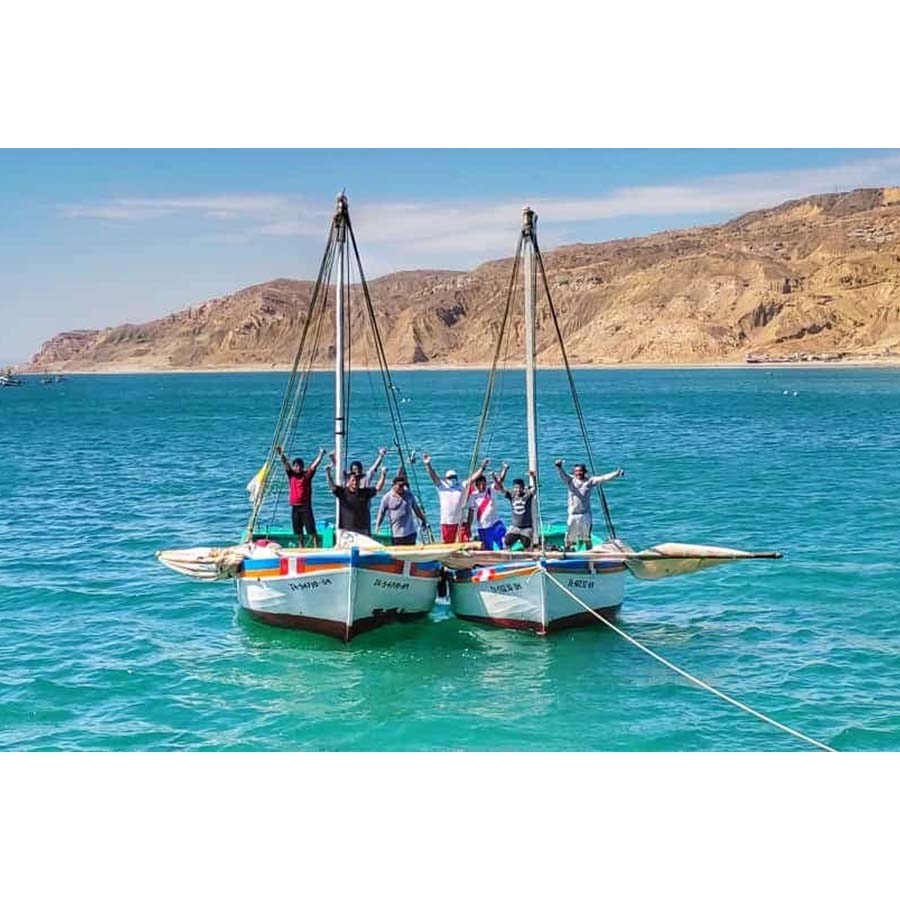 fishermen celebrating San Pedro Day on boats in Cabo Blanco, Peru