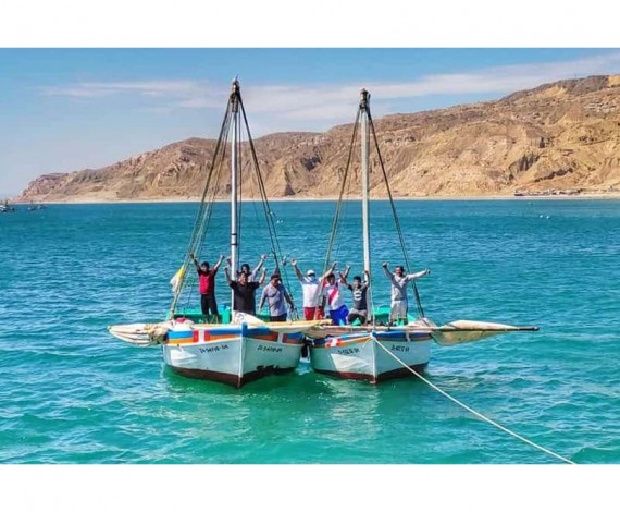 fishermen celebrating San Pedro Day on boats in Cabo Blanco, Peru